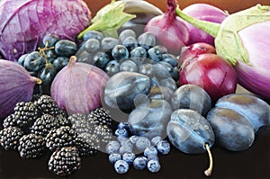 Blue and purple food. Berries, fruits and vegetables