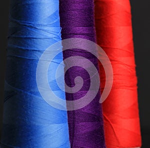 Blue purple and scarlet thread