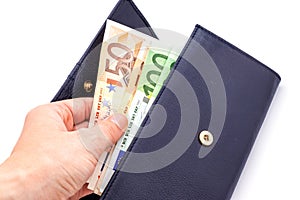 Blue purse with euros in the hands on white background