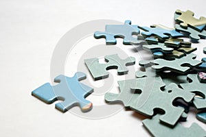 Blue puzzle pieces on white background