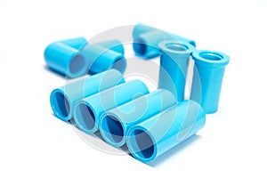 Blue PVC pipe fittings.