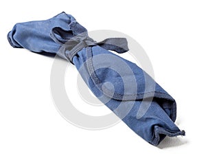 Blue rag pouch with knotted knot and surprise inside on white isolated background