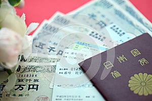 Blue and red Japan Health Insurance cards on table with japanese residence card and my number card