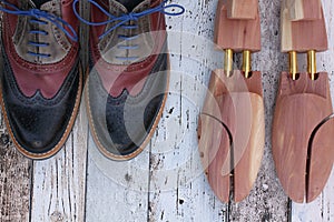 Blue and red leather shoes with cedar shoe stretchers