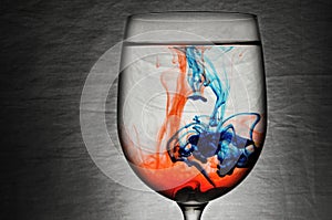 Blue and Red Liquid in Wine glass