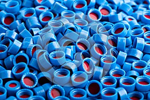 Blue and red plastic caps background