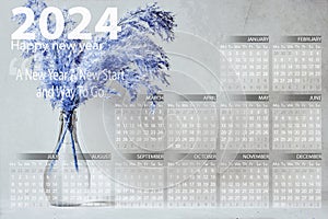 blue reeds vase with 2024 year calendar