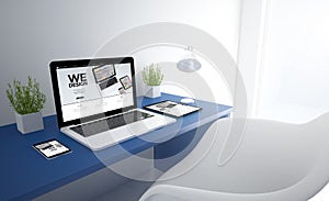 blue responsive studio with we design devices photo