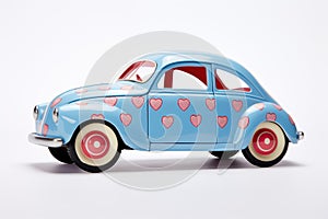 Blue retro car toy with pink hearts, valentines day background. Generative AI