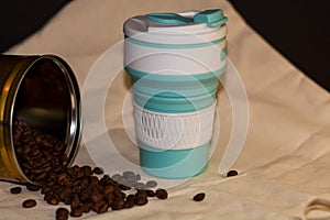 Blue reusable cup transformer for coffee and drinks take away made of food silicone. Repeated processing. Eko friendly.