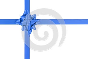 Blue ribbon cross with gift bow isolated on white