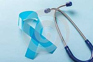 Blue ribbon with stethoscope, prostate cancer awareness month