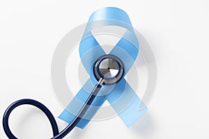 Blue ribbon with stethoscope on white background, prostate cancer awareness month, world diabetes day