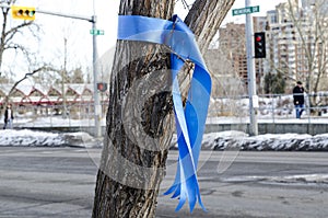 Blue ribbon, the symbol of hope and high quality of life