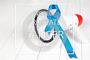 Blue ribbon symbolic of prostate cancer awareness campaign and men`s health in November