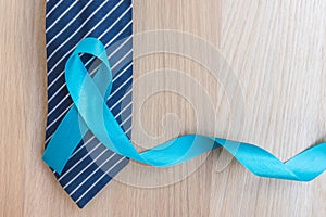 Blue ribbon symbolic of prostate cancer awareness campaign and men`s health in November month