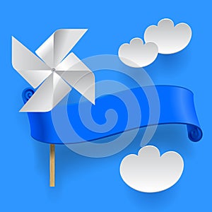 Blue ribbon with wind paper propeller and clouds