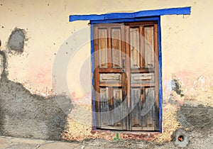 Blue-rimmed wooden door, Mexico