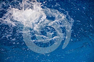 Blue ripped water in swimming pool