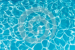 Blue ripped water in swimming pool. water surface background.