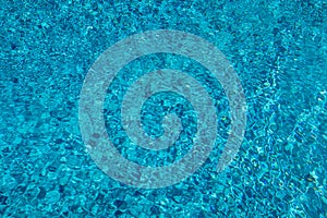 Blue ripped water in swimming pool. Surface of blue swimming pool, background of water in swimming pool. Water swimming pool