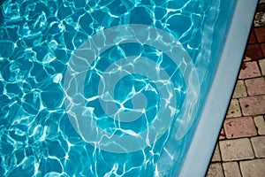 Blue ripped water in swimming pool. water surface background