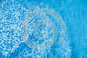 Blue ripped water in swimming pool. water surface background