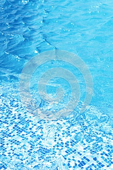 Blue ripped water in swimming pool. water surface background.