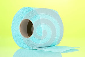 Blue roll of toilet paper