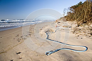 Blue rope on beach