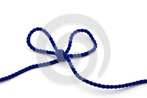 Blue rope tied in a bow, isolated