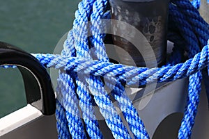 The blue rope is visible on the mooring bollard