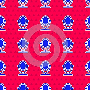 Blue Round makeup mirror icon isolated seamless pattern on red background. Vector