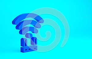 Blue Router and wi-fi signal icon isolated on blue background. Wireless ethernet modem router. Computer technology internet.