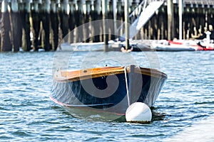 Blue row boat moored in Bar Harbor Maine, USA