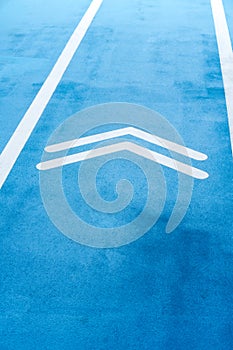 Blue Running track with double arrows symbol