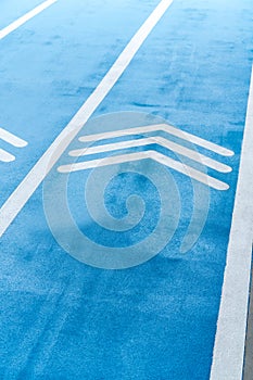 Blue Running track with thiplet arrows symbol