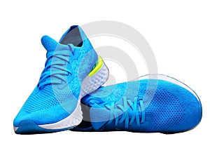 Blue runnung or sport shoes on isolated white background