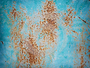 Blue rusty metal surface with cracking texture