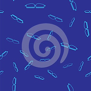 Blue Safety goggle glasses icon isolated seamless pattern on blue background. Vector Illustration