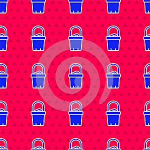 Blue Sand in bucket icon isolated seamless pattern on red background. Plastic kid toy. Summer icon. Vector