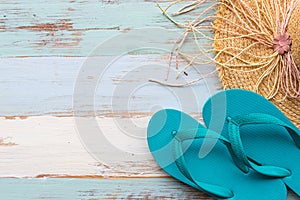 Blue sandals and brown straw hat