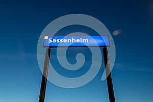 Blue Sassenheim sign on the train station in Sassenheim