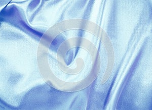 Blue satin background. Cloth texture. Background texture concept with copy space