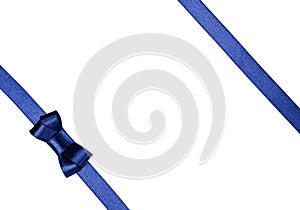 Blue satin ribbon tied in a bow isolated on white