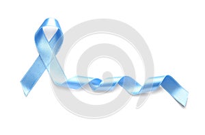 Blue satin ribbon on white background. Prostate cancer awareness concept