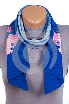 Blue scarf on mannequin isolated on white background.