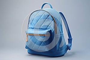 Blue school bag on a gray background. Back to school.