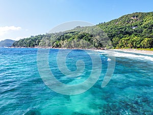 Blue sea in Anse Takamaka beach seen from above