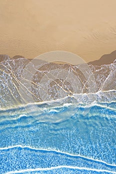 Blue sea at the beach seen from above